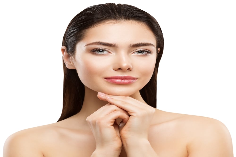 Woman with refined nose after rhinoplasty in Miami